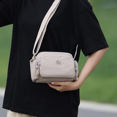 Ultraleichte wasserdichte Messenger-Tasche aus Nylongewebe für Damen, 2025 neu, lässige und leichte mehrlagige Schultertasche, Handytasche