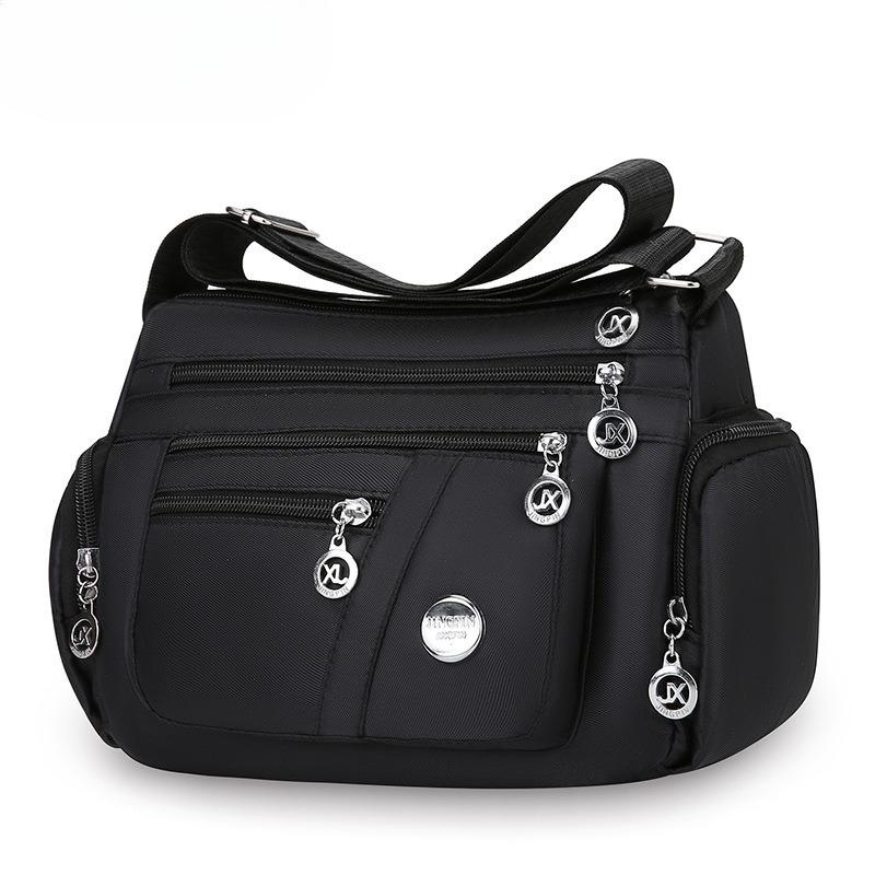 Bag Women's Large Capacity Shoulder Bag Waterproof and Wear Resistant Multi Pocket Commuter Leisure Outdoor Crossbody Bag