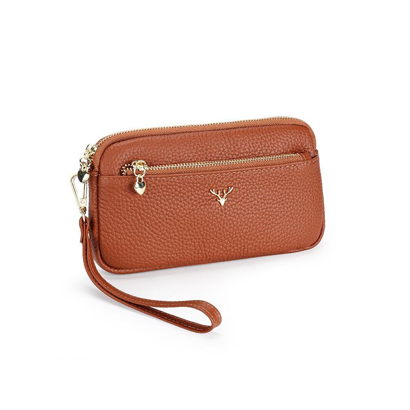 Pochette in pelle da donna 2025 nuova portafoglio lungo in pelle di mucca borsa a mano per madre borsa portamonete in pelle morbida borsa versatile per cellulare