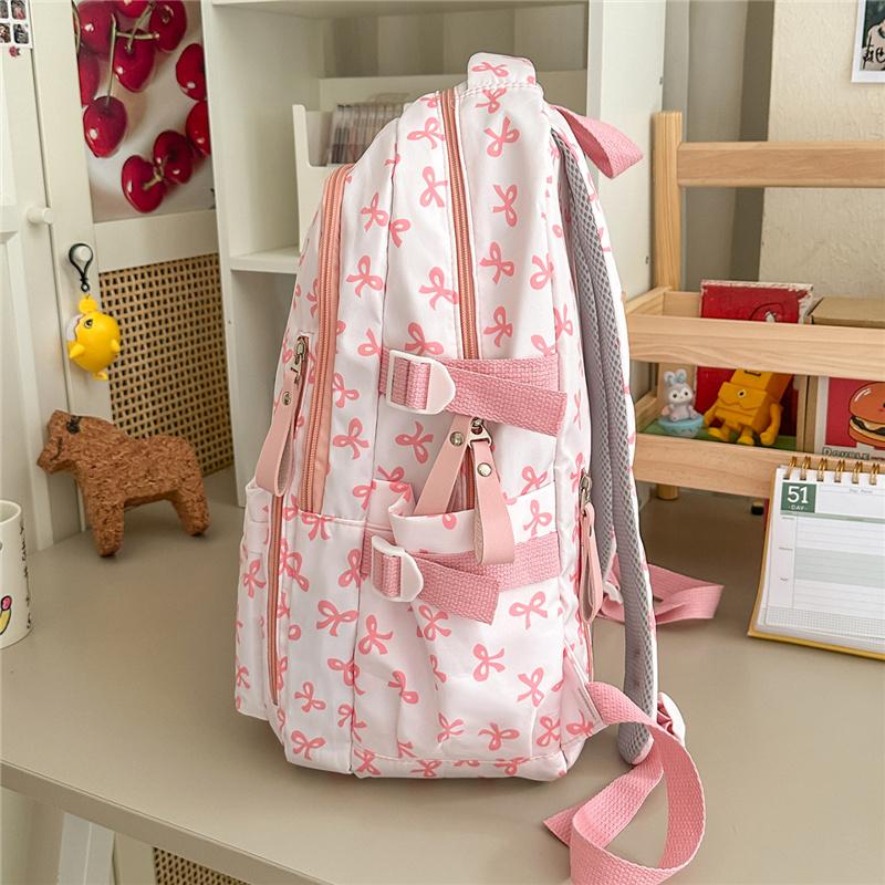 Cute Bow Print Backpack for Women Lightweight Casual Daypack Travel School Bag with Multi Pockets