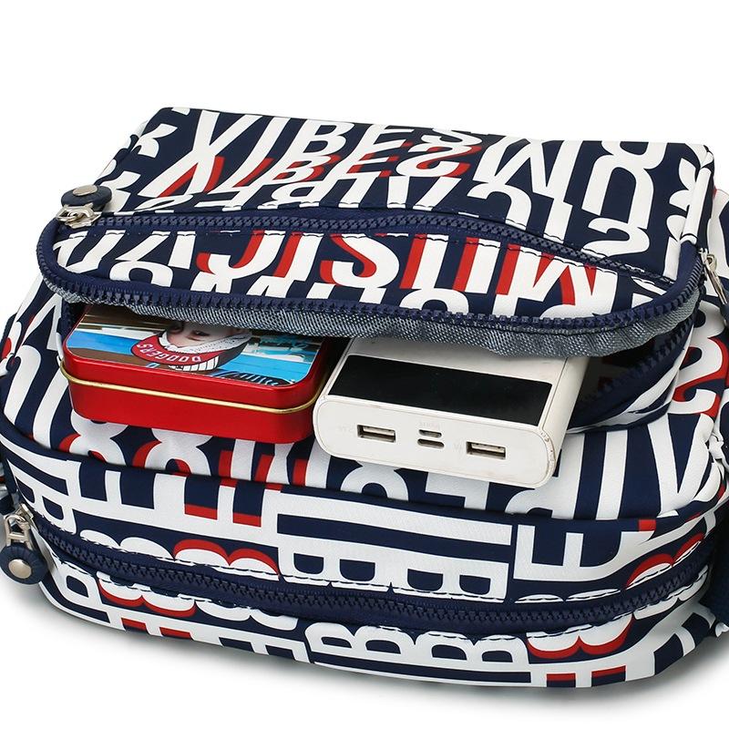 Women's Bag New Korean Version of Ladies' Cross Body Bag Multi Layer Large Capacity Cross Body Bag for Middle Aged Mothers.