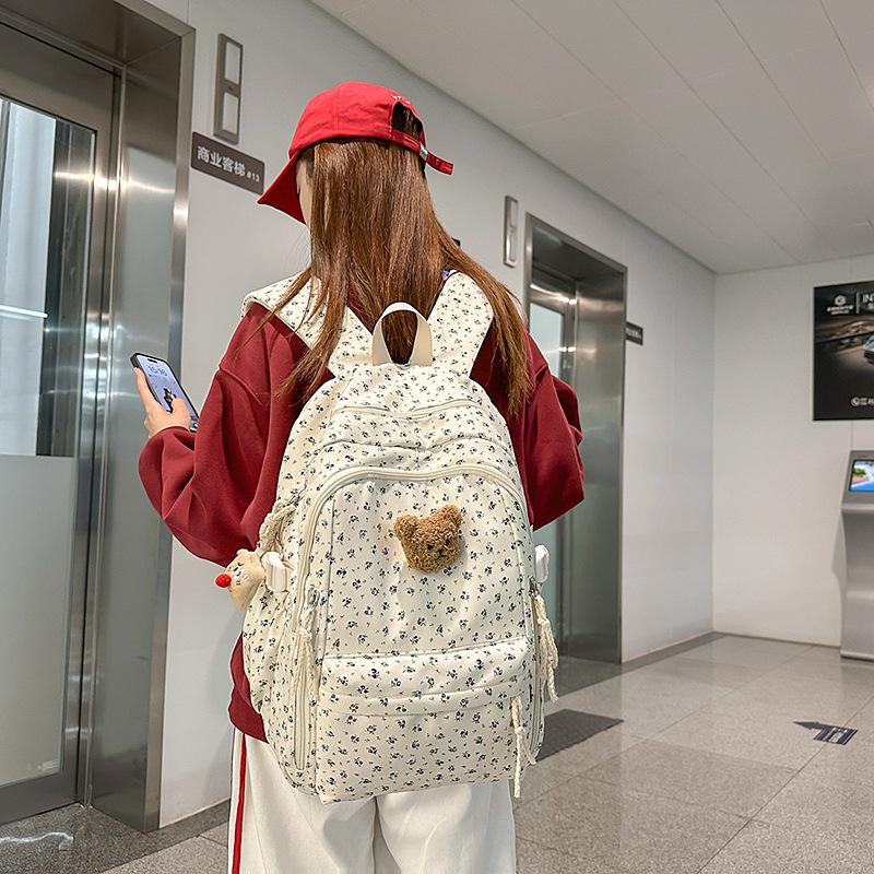 Small fresh schoolbag female college student cute small floral travel backpack lightweight large capacity junior high school student backpack