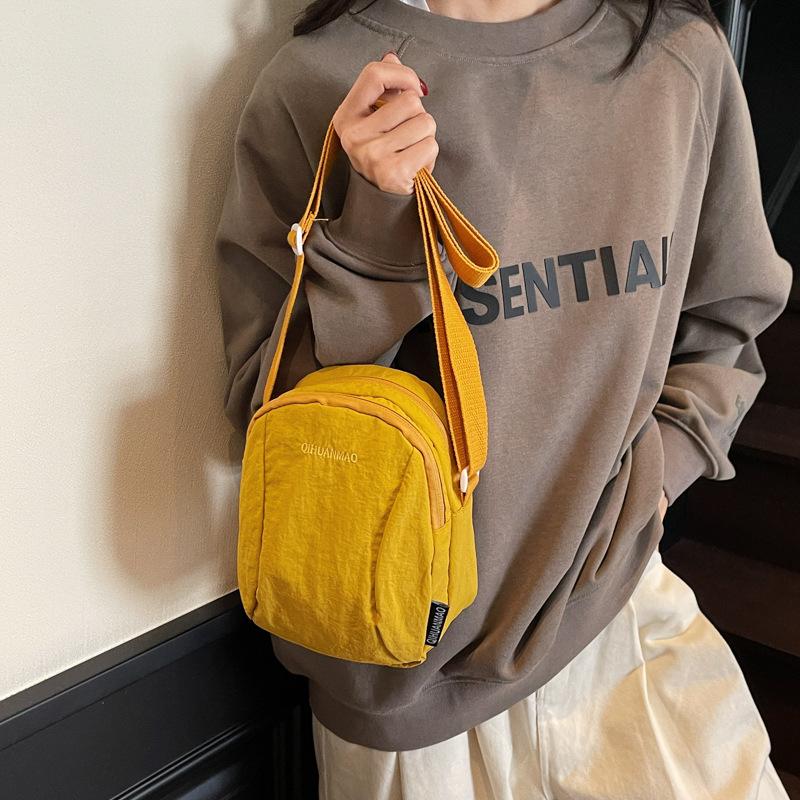 Versatile small bag Crossbody bag Women's casual canvas bag Light commuter cloth bag Men's mobile phone bag