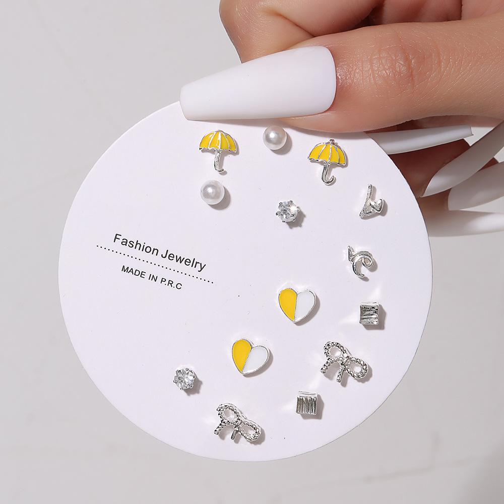 Korean version of small stud earrings, exquisite 1 pair of stud earrings a week, simple color dripping small earrings, love zircon stud earrings.