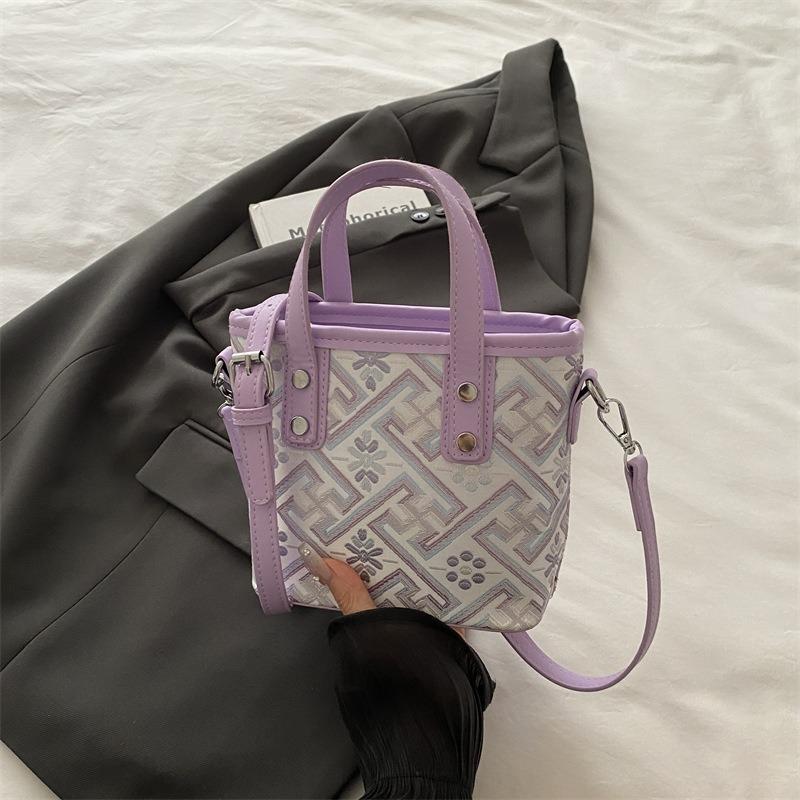 

Новая портативная сумка-ведро с узором Wanji, высококлассная, легкая, роскошная, универсальная, на плечо, кроссбоди, женская фиолетовый