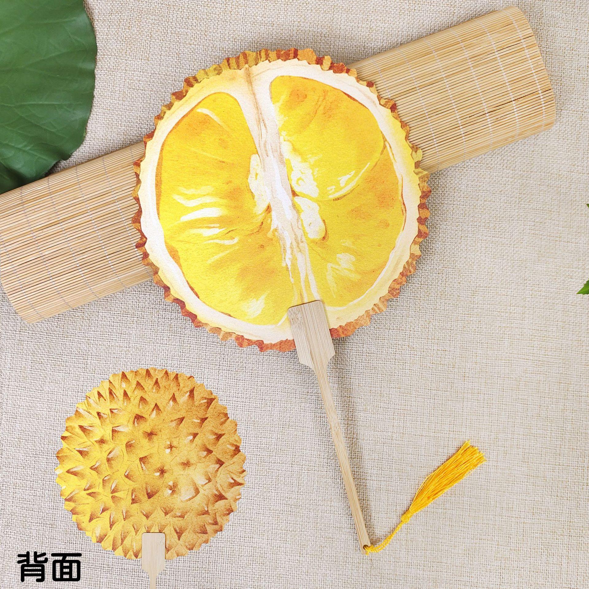 

Hand-Drawn Double-sided Asymmetrical Rice Paper Fan | Wooden Grip & Tassel, Summer Fruit Print | for Gifting & Decor