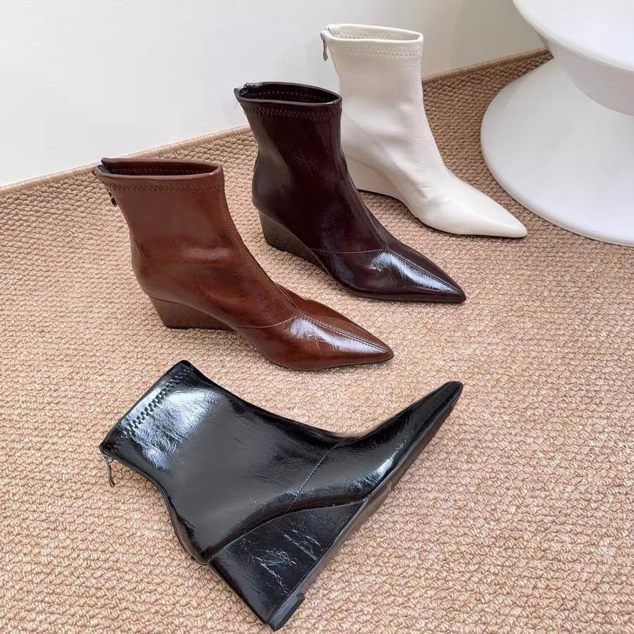 Inner heightening Martin boots women's 2025 new autumn and winter temperament thin pointed wedge heel high heel short boots rear zipper boots