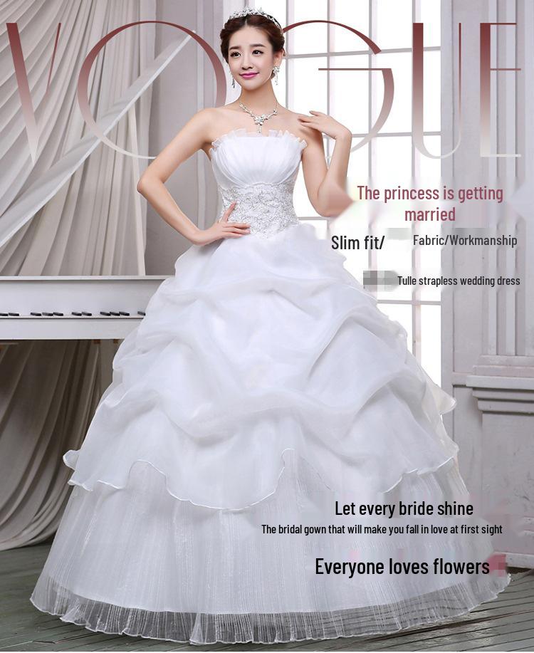 2025 Bílé šněrovací šaty bez ramínek v korejském stylu, délka až na zem, organzové svatební šaty