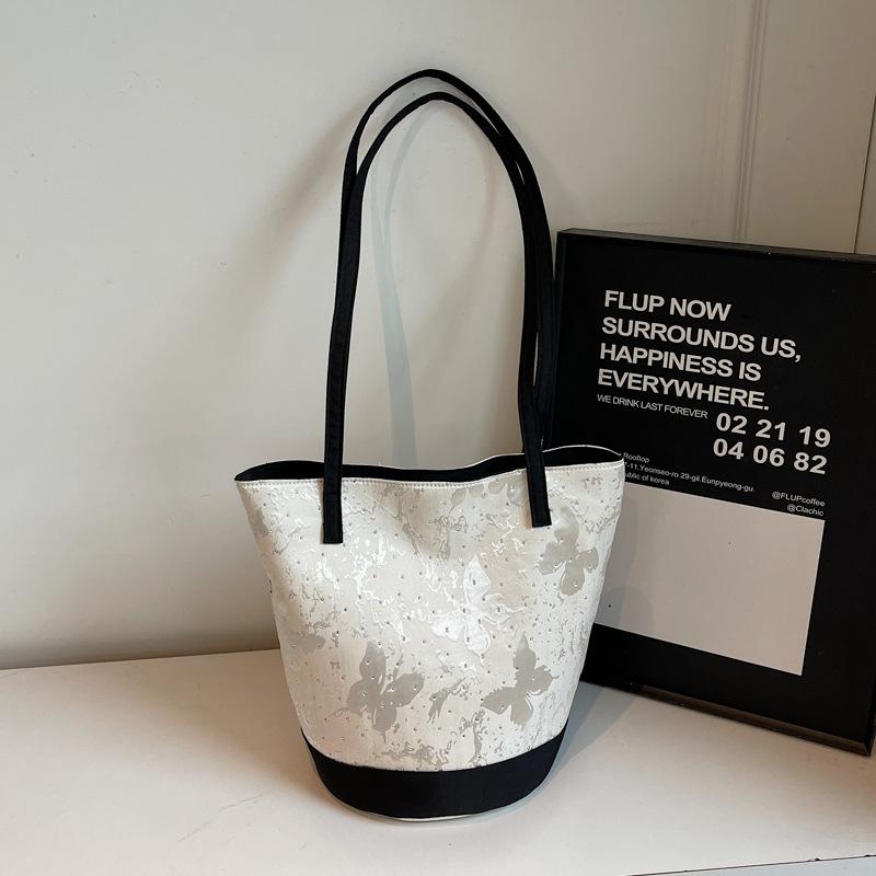 Summer contrast niche butterfly bucket bag 2025 summer new fashion simple foreign style underarm shoulder bag
