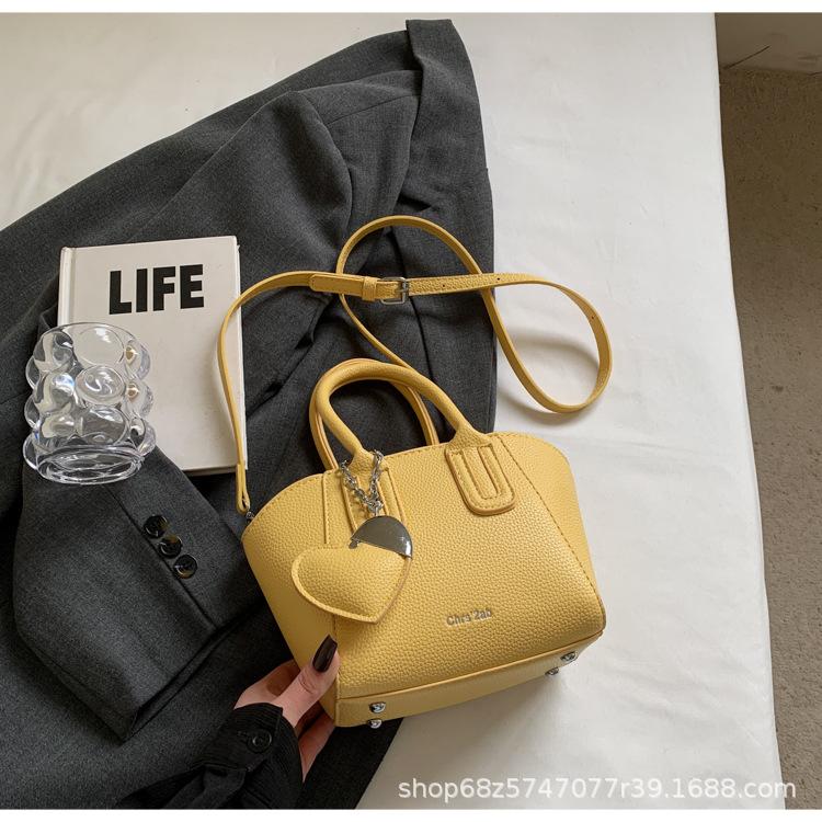 Trendy portable bucket bag 2025 summer new ins simple Auruofeng shoulder bag niche fashion messenger bag