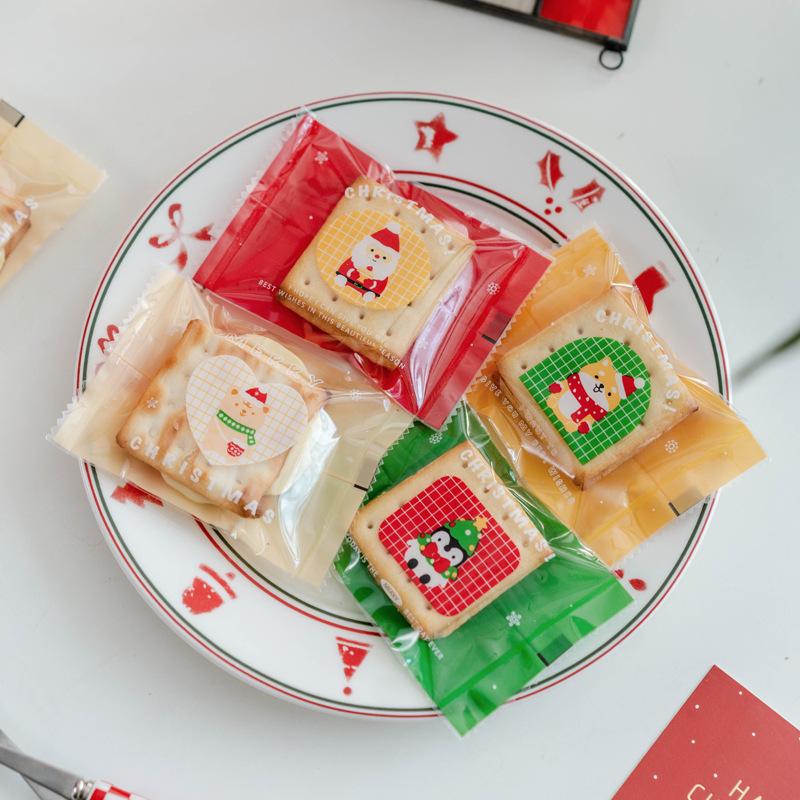 100Pcs 7x10cm Christmas Cartoon Printed Machine Sealing Snowflake Pastry Candy Cookie Packaging Xmas Party Gift Bags