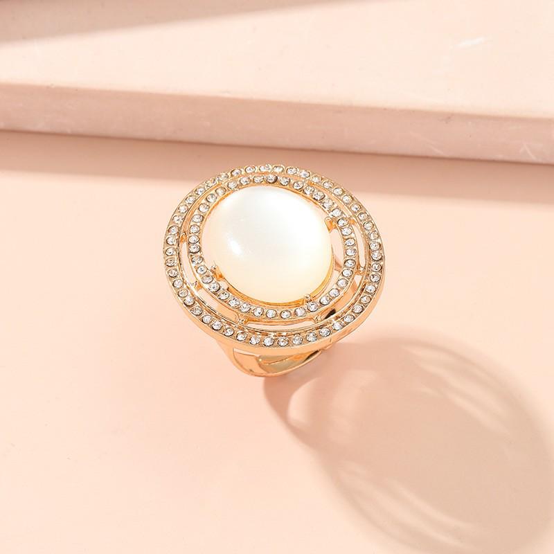 

Элегантное золотое разомкнутое кольцо с камнем «кошачий глаз»: Трендовое европейское и американское модное заявление Adjustable Open