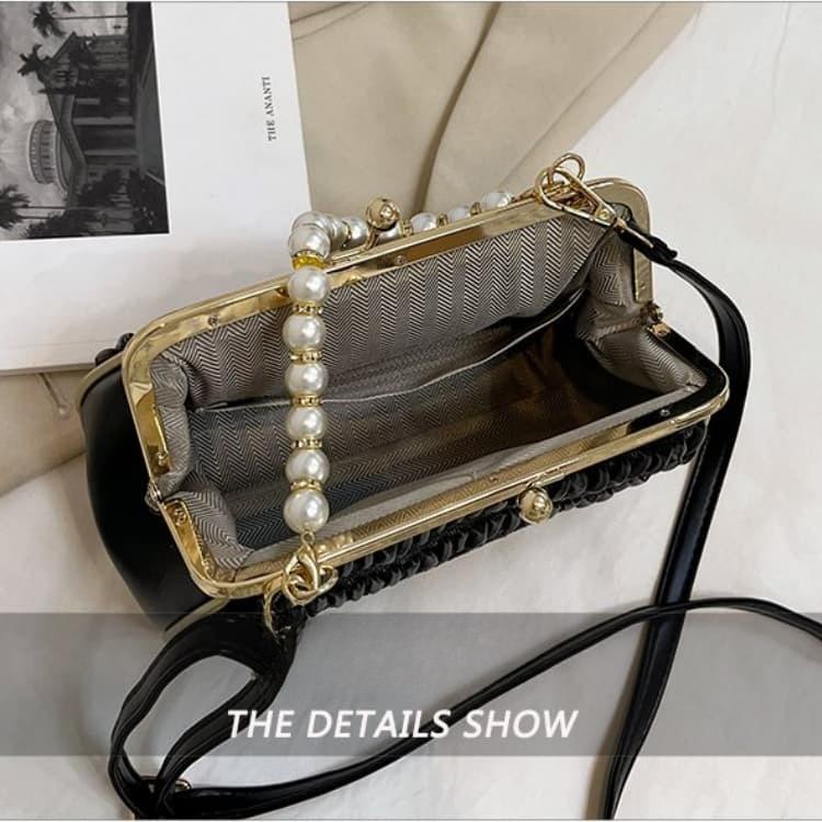 Folded mouth gold bag women's light luxury pearl handbag