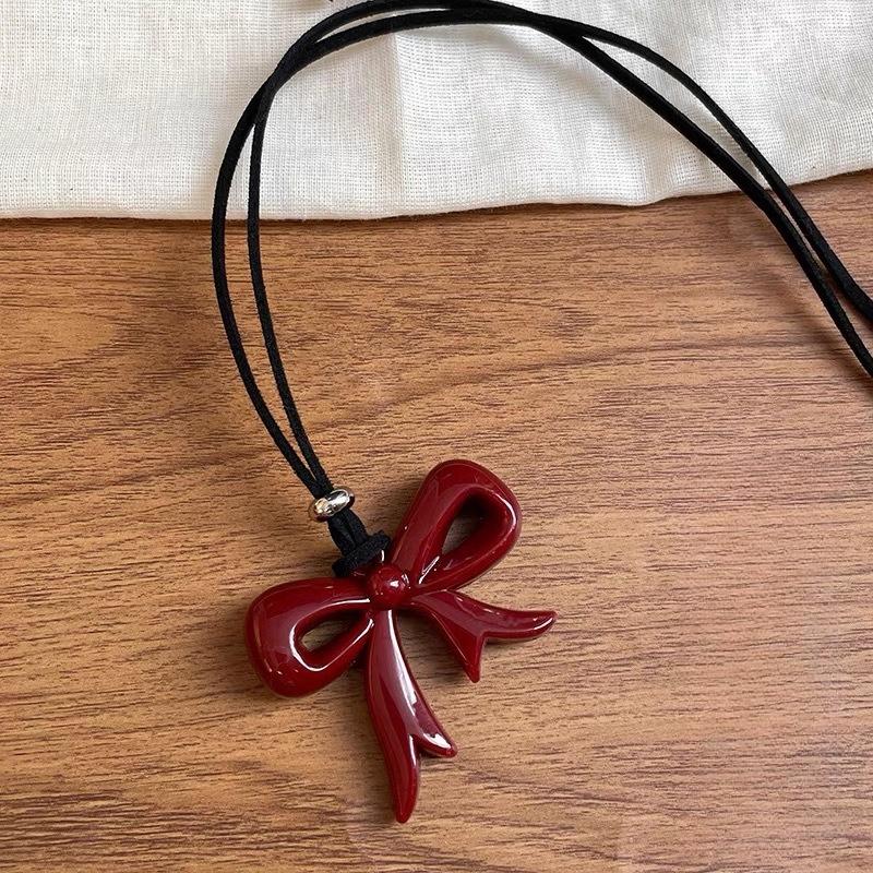 

1 шт. Ожерелье с красным бантом Ankola Женская минималистичная цепочка для свитера Нишевые универсальные аксессуары из черной кожаной веревки