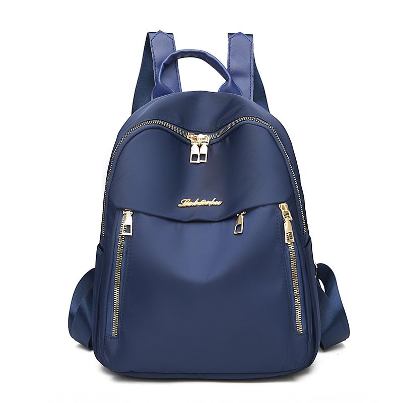 1 women's travel backpack, large capacity Oxford cloth nylon backpack, with adjustable shoulder straps, black color, zipper clos
