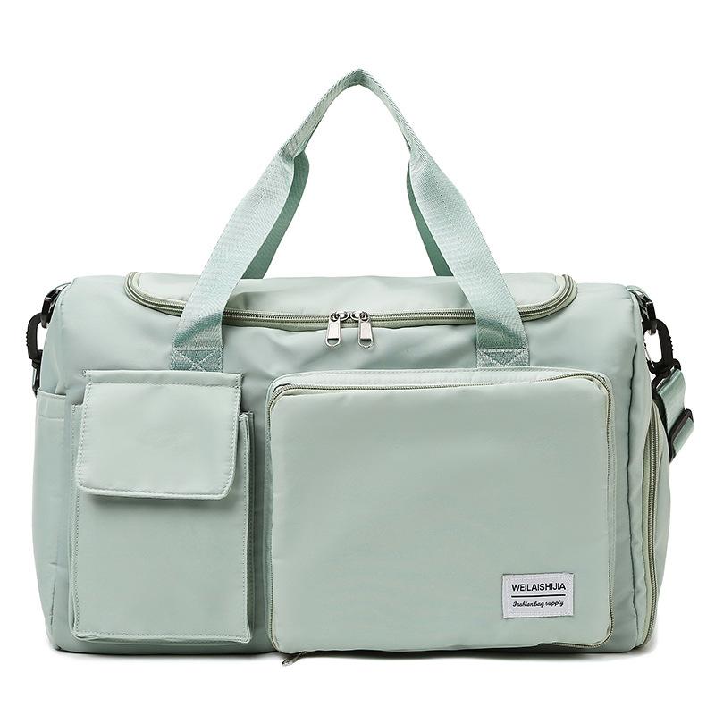 

Simple and large-capacity portable shoulder travel bag, independent compartment, leisure travel, business trip boarding bag, dry and wet separation зелений