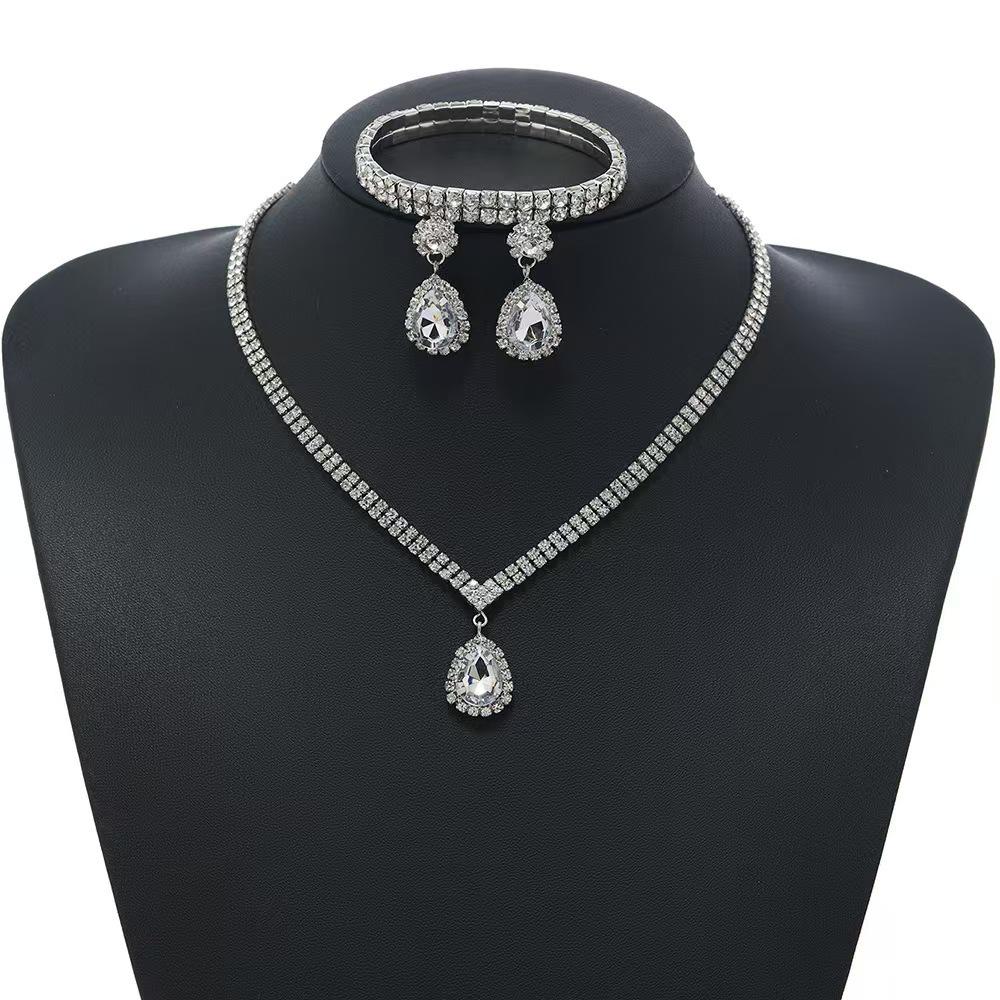 Women's Sparkling Diamond Jewelry Set: Crystal Drop Necklace, Earrings, and Bracelet Trio