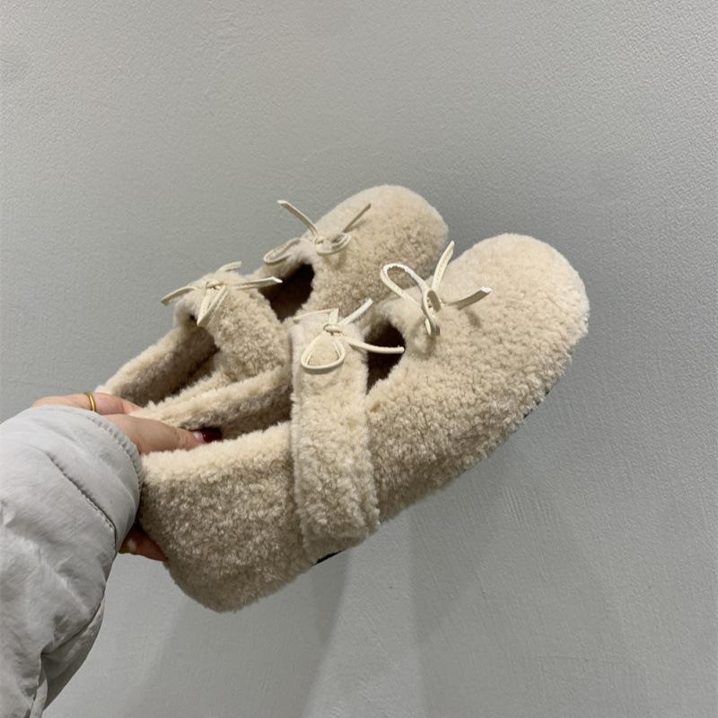 

2025 new inner height increase 4cm fluffy shoes women wear autumn and winter warm and velvet soft-soled single shoes French cotton shoes. 40