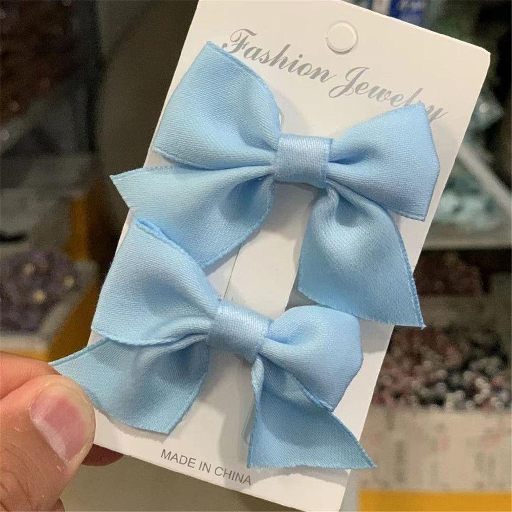 

2Pcs Sweet Solid Color Little Girl Kids Hair Clips Bowknot Barrettes Bow Headgear Baby Hairpins синій