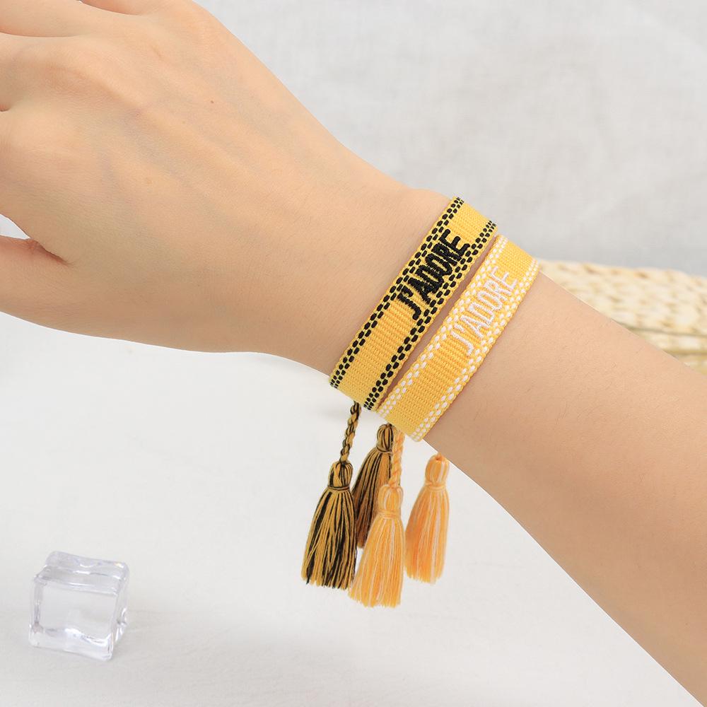 Pulseira Tecida Europeia e Americana de 1,3 cm com Bordado de Letras e Borla