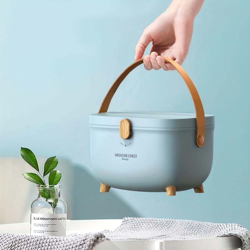 Large multi-layer medicine storage box with handle. Dustproof plastic, perfect for household medicine storage.