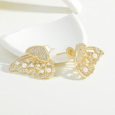 Boucles d'oreilles papillon quotidiennes pour femmes incrustées de perles aiguille en argent