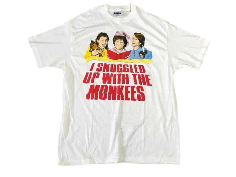 i snuggled up with the monkees the monkees t shirt vintage 80s band tee whi Unisex T-Shirt L