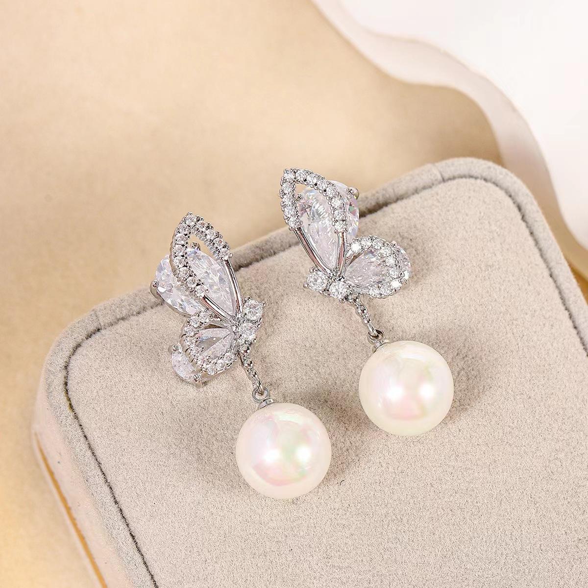 Silver needle butterfly wings pearl earrings design simple light luxury temperament stud earrings 925 silver needle