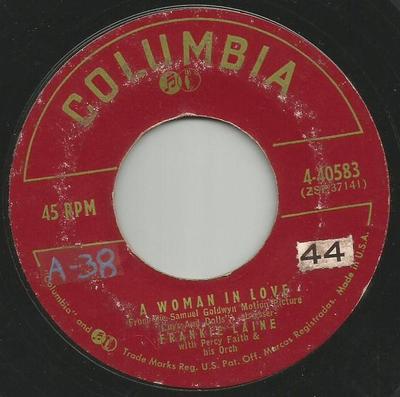 7inch Record FRANKIE LAINE - A Woman In Love / Walking The Night 440583 COLUMBIA 1955 US Pop Used