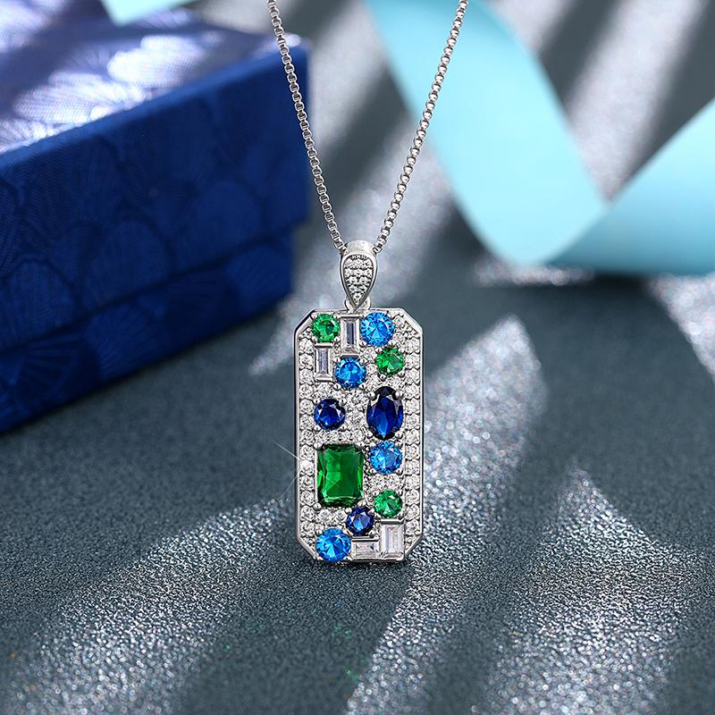 Huitan Collier Pendentif Géométrique de Luxe Complet avec Zircone Cubique Bleu/Vert Nouveaux Accessoires de Cou Tendance pour Femmes Bijoux de Mariage