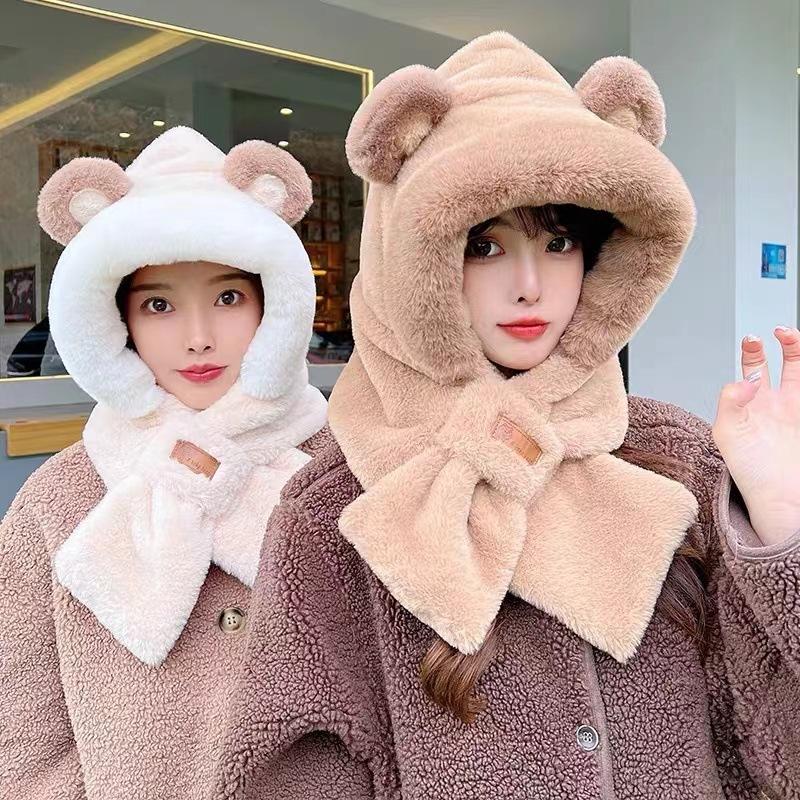 This integrated scarf and hat is a warm, plush, thickened faux rabbit fur hat perfect for autumn and winter, with cute ear flaps.