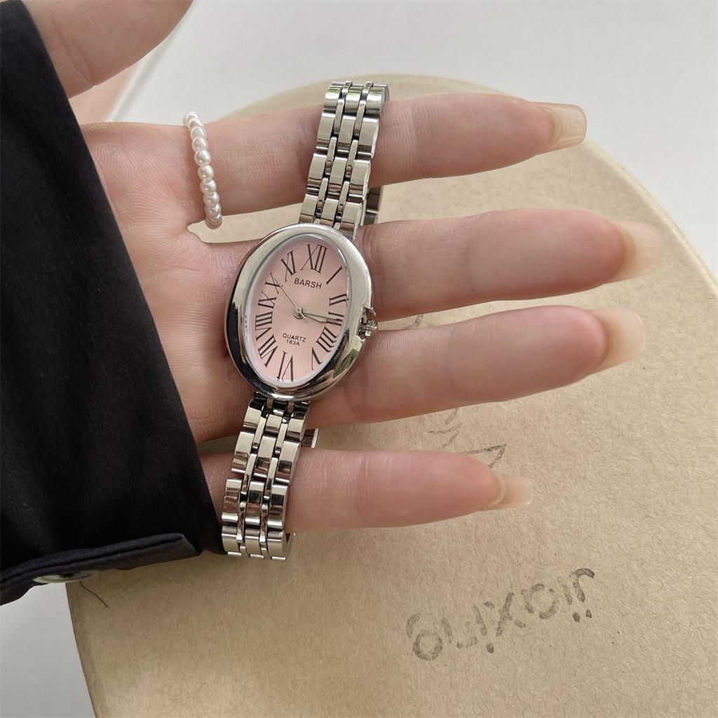 Retro gold women's watch, fashionable oval shaped temperament, steel strap, quartz watch