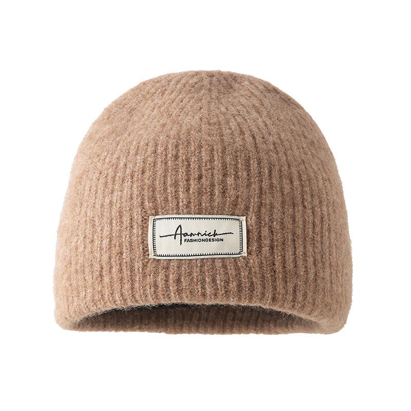 Simple cloth label wool wool hat women's autumn and winter comfortable cold hat outdoor cycling ear hat fashionable versatile knitted hat