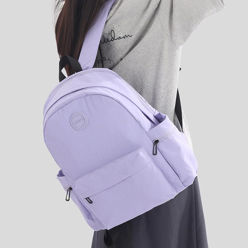 Schoolbag Korean version of high-value casual backpack for women college students, simple and lightweight schoolbag, large-capacity commuter