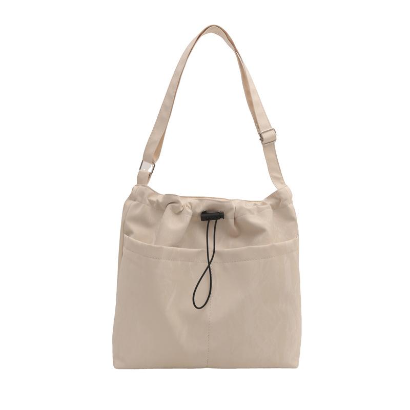 

Повсякденна сумка великої місткості жіноча літня 2024 нова модна фактурна сумка під пахвами для приміських поїздок через плече білий