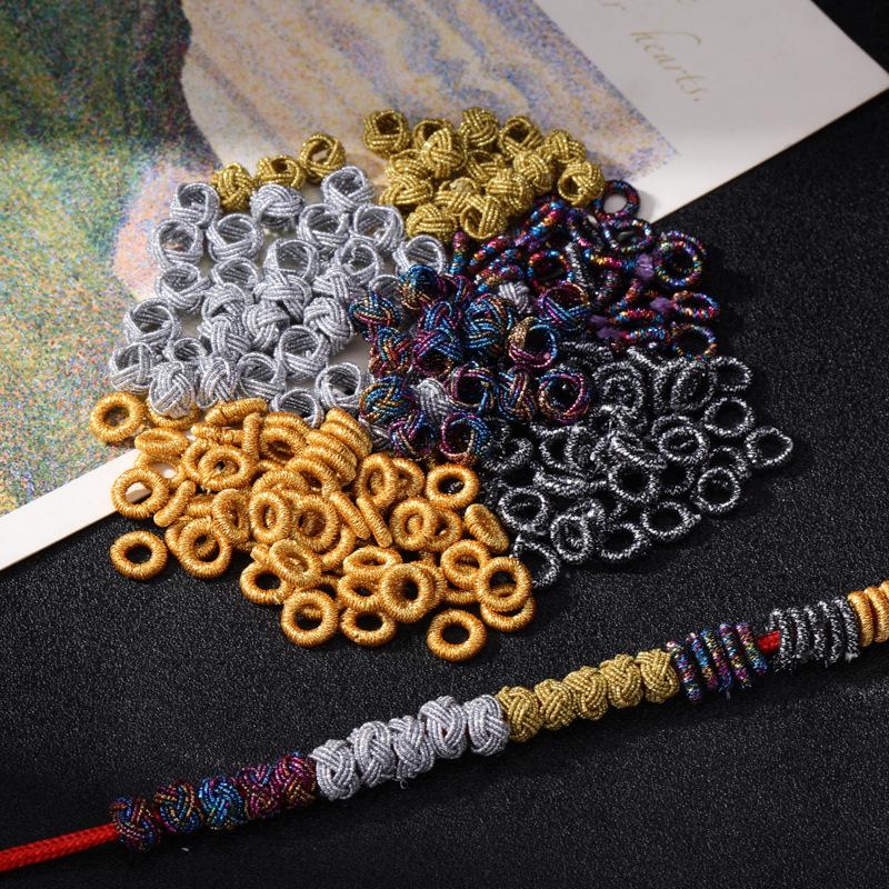 Exquisite Gold Ring with Wire Coil, Gold & Silver Buckle, and Woven Knot Ball