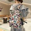 High-value Schoolbag Women's Large Capacity New Fashion Small Floral Backpack Japanese Junior High and High School Student Backpack