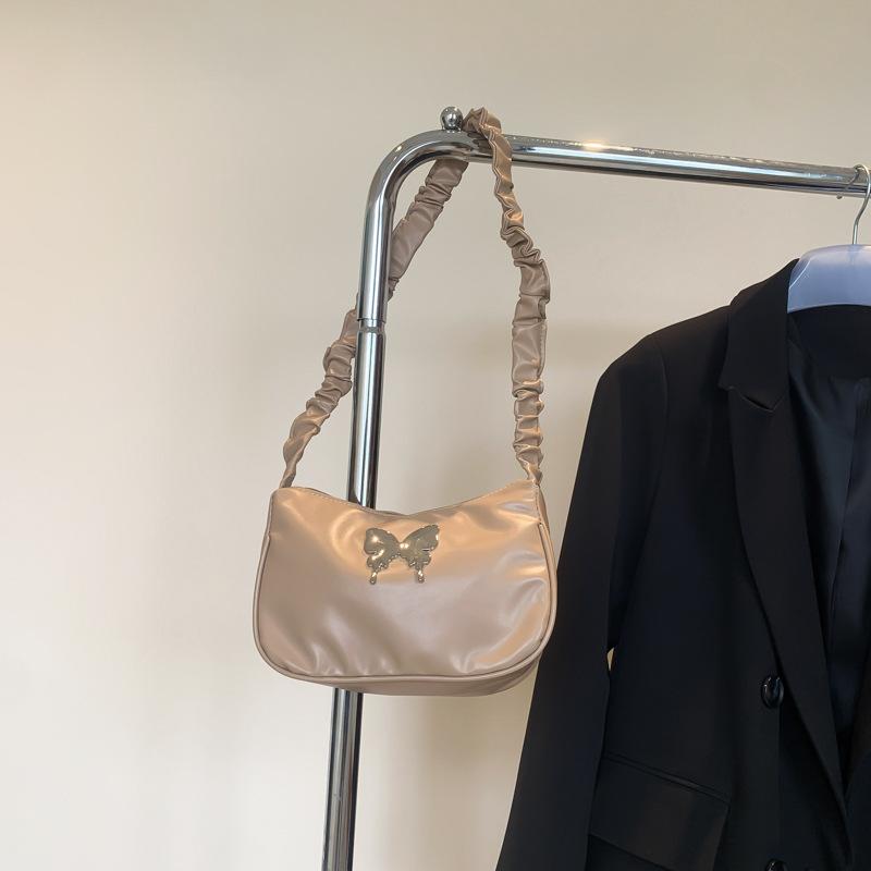 

Niche design texture bag women s 2024 new daily simple personality summer casual shoulder armpit small square bag хакі