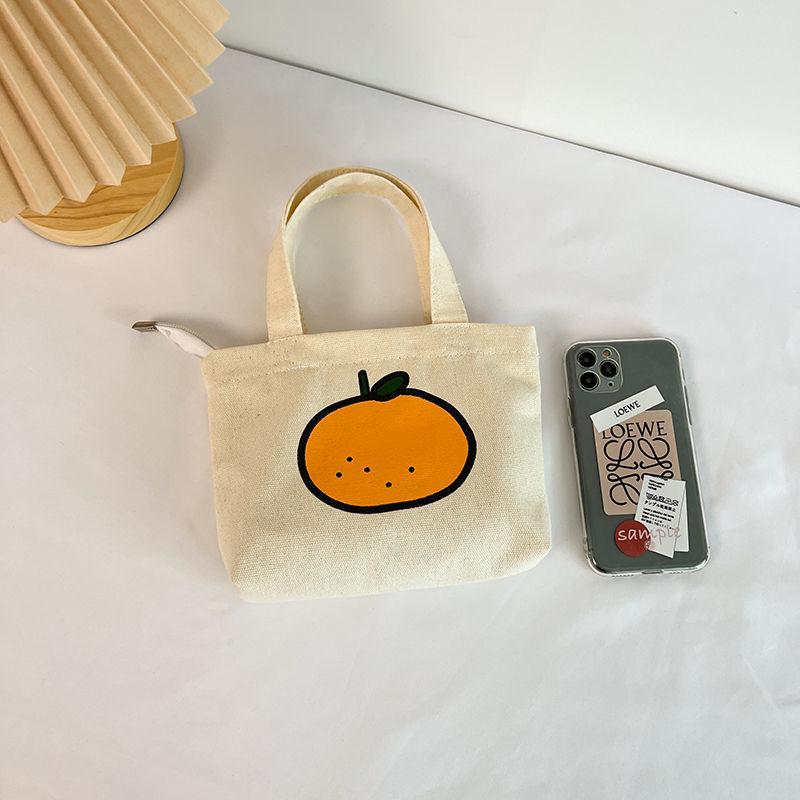 

2025 Women s Korean Style Versatile Canvas Handbag - Portable and Simple for Outings and Shopping Single Bag