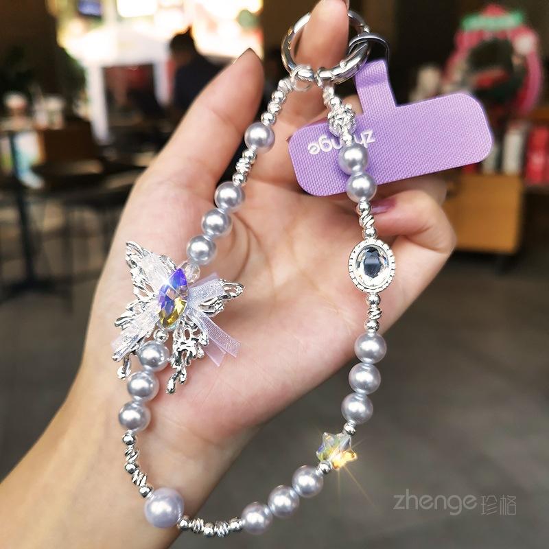 

High-end gemstone butterfly pearl mobile phone chain ins fashion women s wrist pendant beaded chain short style [purple] gem butterfly pearl bracelet