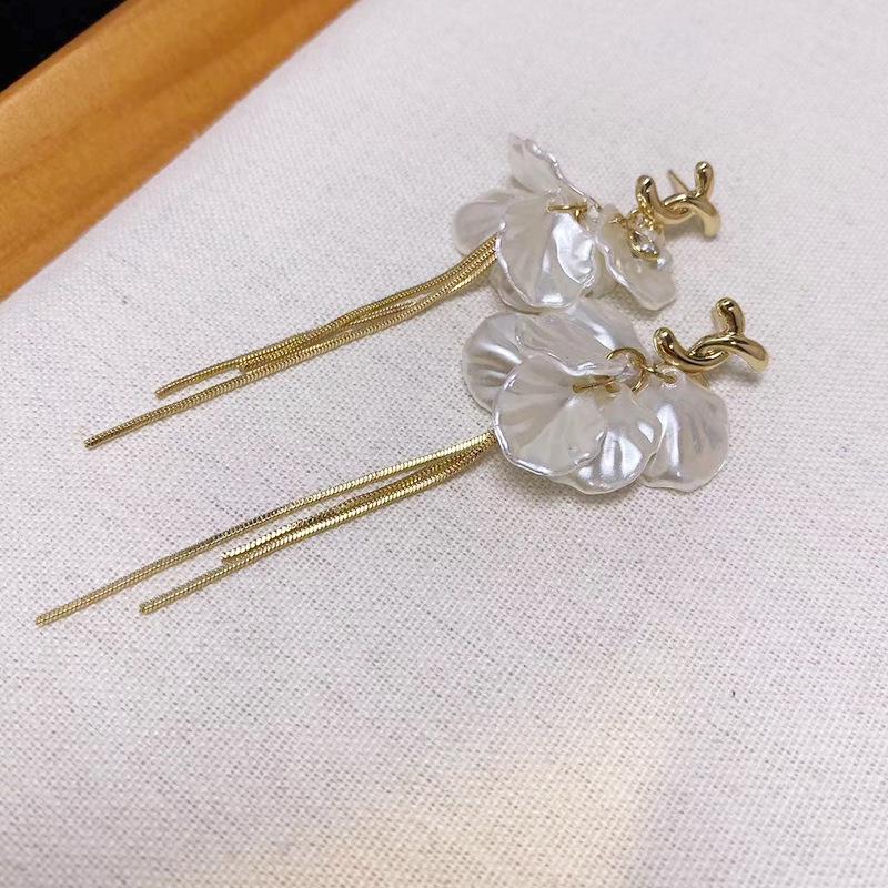 Korean Style Long Flower Bow Earrings with Imitation Mother-of-Pearl Leaf Tassels - Fashionable Vacation Fairy Ear Accessories for Women.