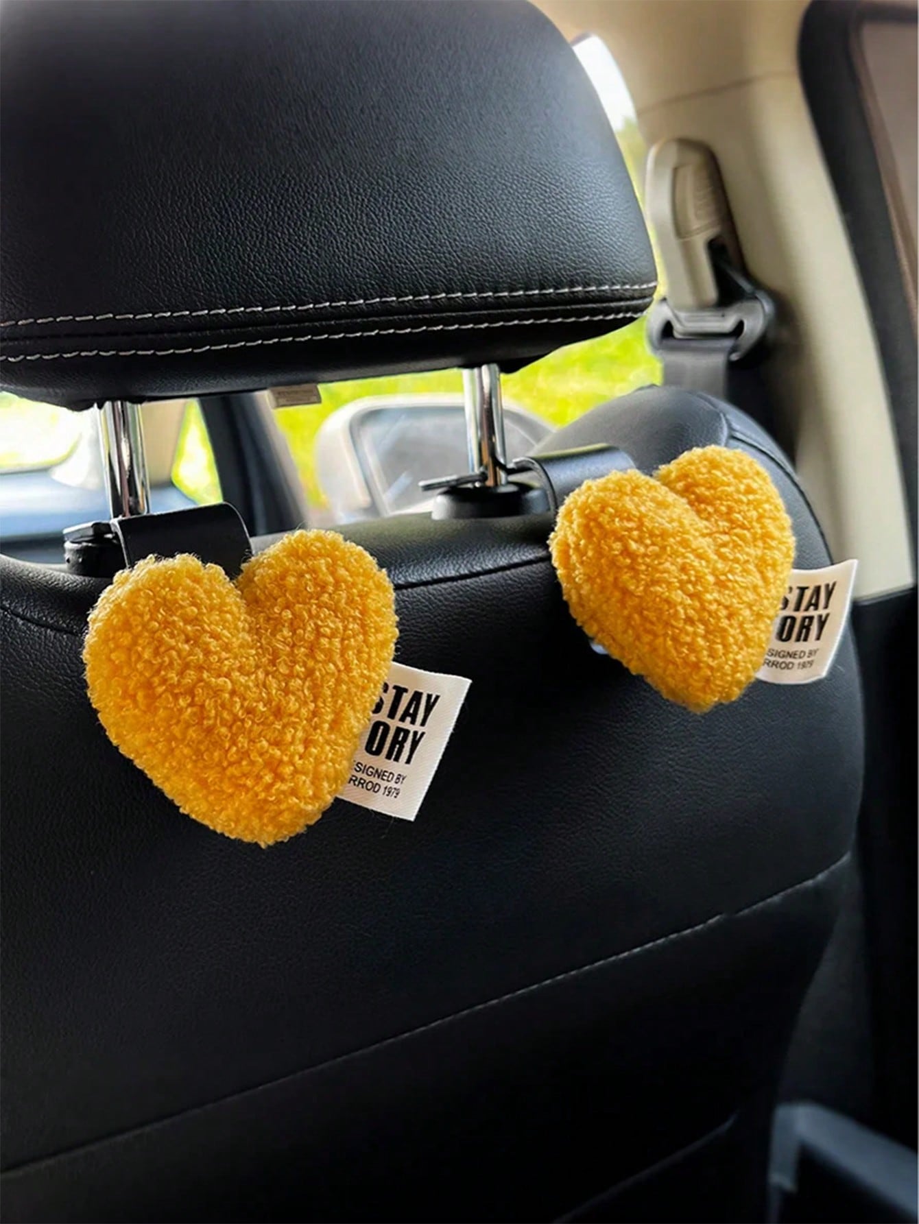 

2 plush heart-shaped car hooks - durable and cute seat back hooks for bags and clothes. Easy to install. Perfect car accessories