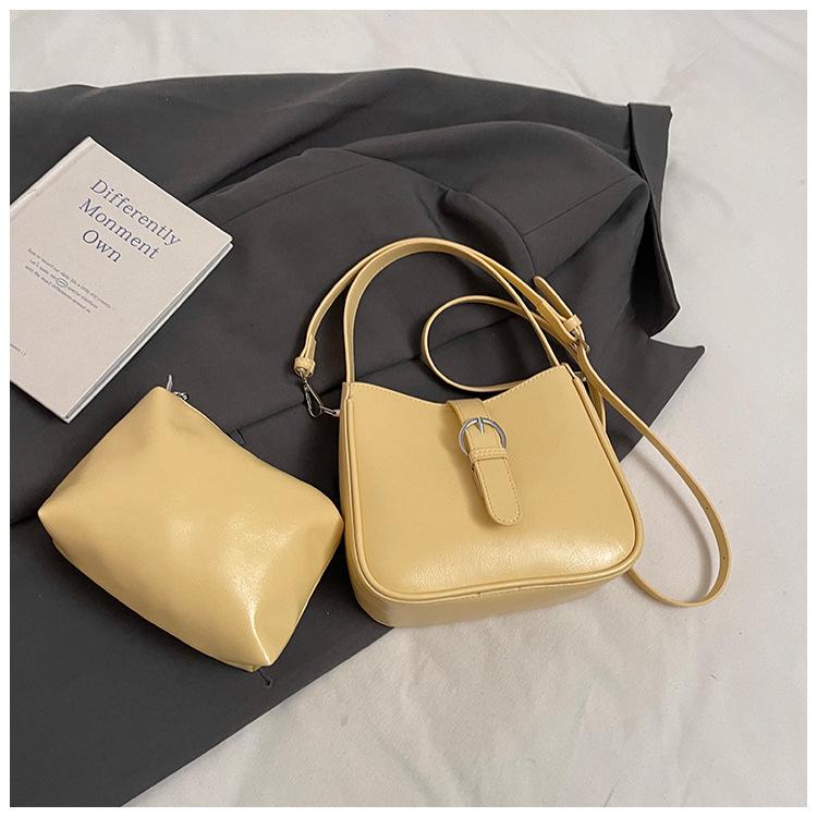 Simple and fashionable portable small square bag, new trend texture versatile solid color versatile mother and child bag women's bag