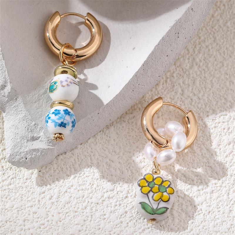 Included Geometric Pearl Drop Earrings For Women With Copper Material And Unique Shape