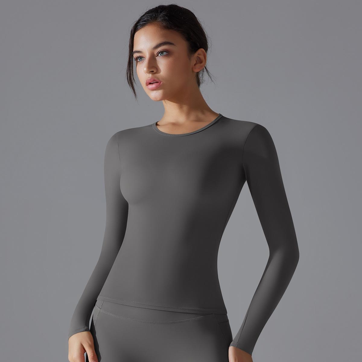 

Новый тренд одежды для йоги Спортивный топ с длинным рукавом однотонный прилегающего кроя эластичный для фитнеса и формирования фигуры для бега и тренировок для женщин S темно серый