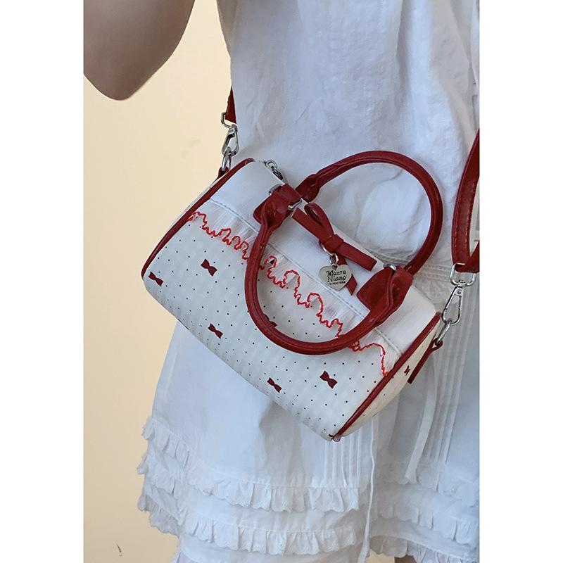 Niche sweet polka dot bow handbag women's 2025 new fashion pillow bag versatile shoulder messenger bag