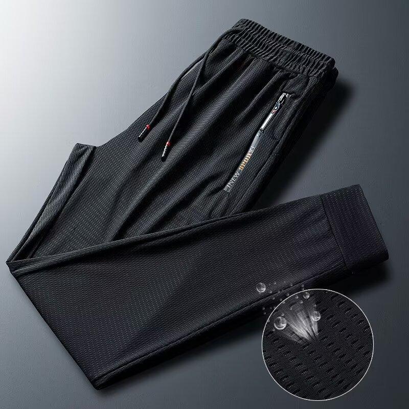 Ice silk mesh cool and breathable sweatpants men's summer thin green loose casual trousers