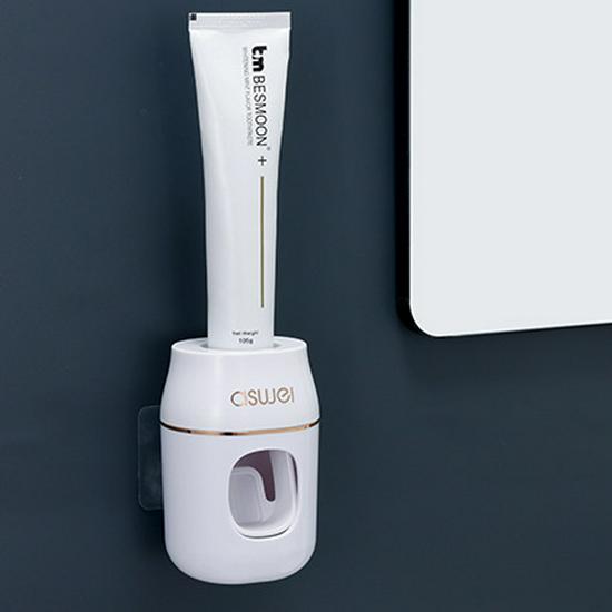 

Automatic Wall-Mounted Toothpaste Dispenser and No-Punch Storage Rack with Suction Cup for Kids and Adults.