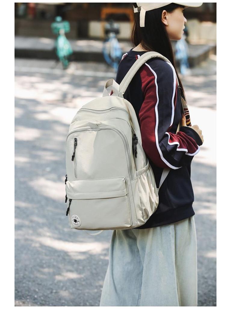 Niche Lightweight Nylon Backpack: Large-Capacity, Casual, Unisex Shoulder Bag for Commuters and Students