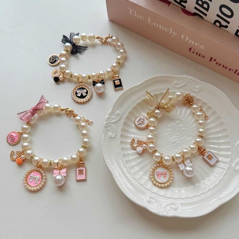 Retro Pearl Dog Necklace with Bow Pendant - Accessory for Yorkshire Terriers and Maltese